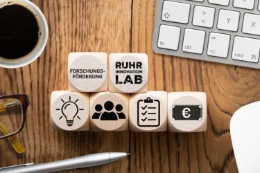 Symbolbild mit Würfeln